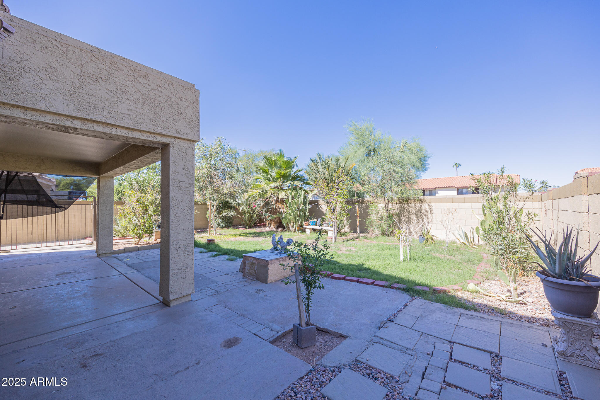 730 West Kent Place Chandler, AZ 85225 - Photo 29 of 29 a house view with a garden space