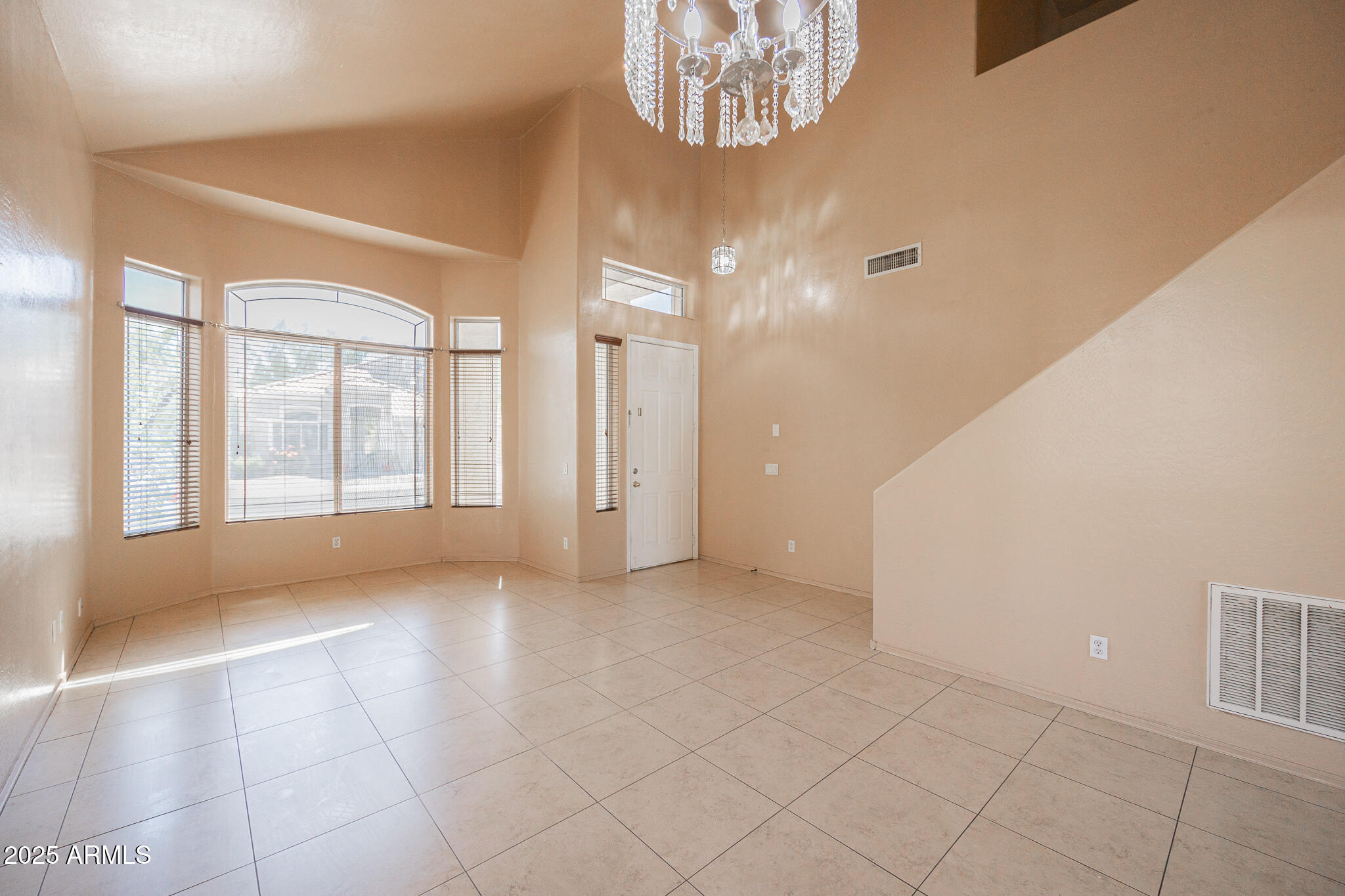 730 West Kent Place Chandler, AZ 85225 - Photo 5 of 29 a view of an empty room with a window