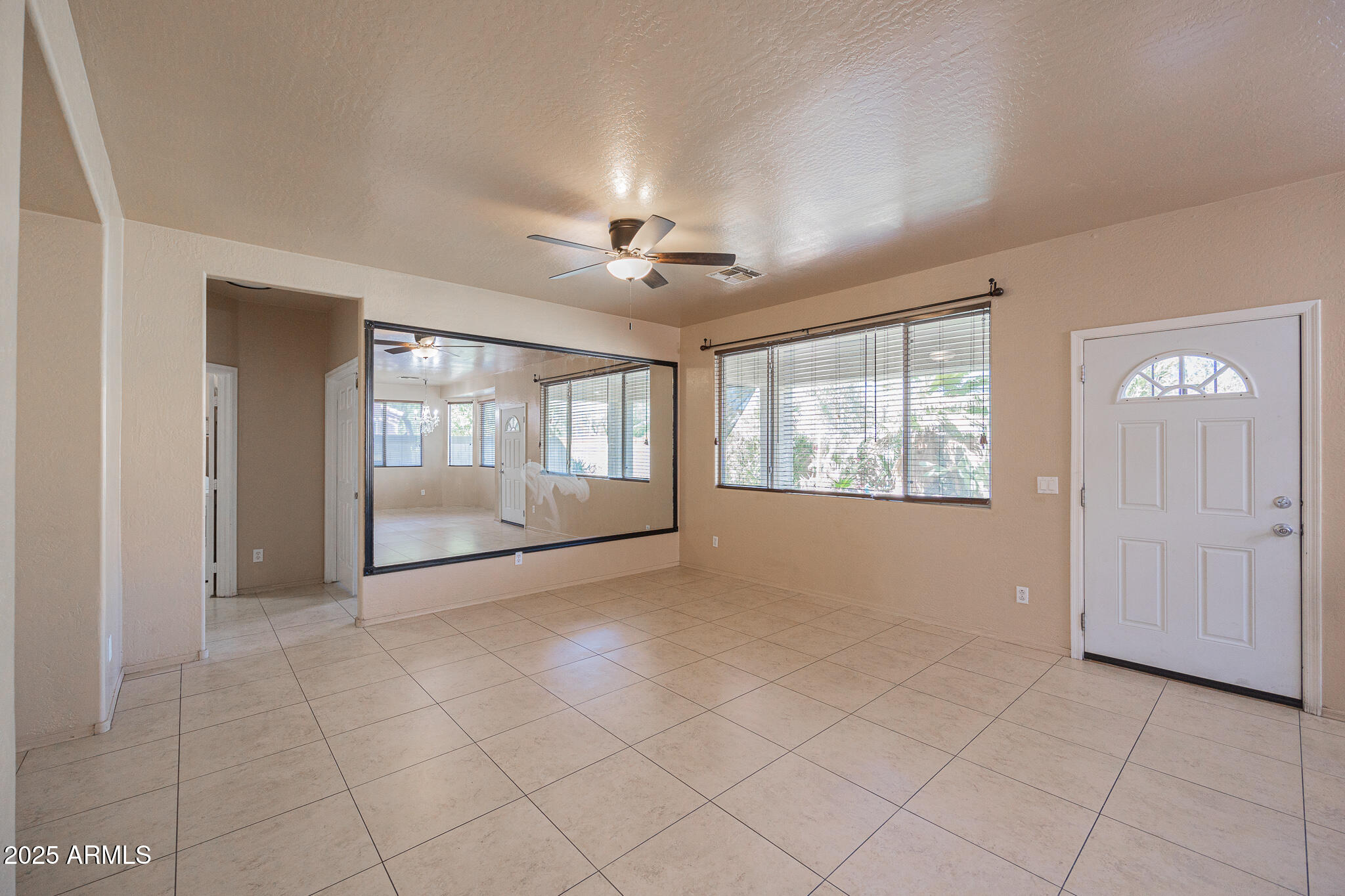 730 West Kent Place Chandler, AZ 85225 - Photo 7 of 29 a view of an empty room with a window
