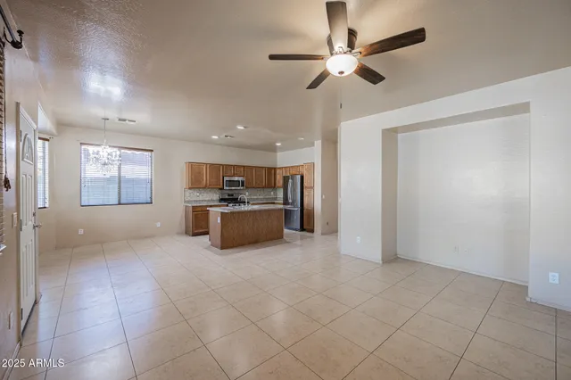 a kitchen with a cabinets and a stove top oven
