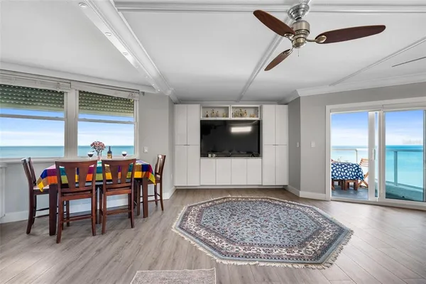 a kitchen with appliances a sink and cabinets