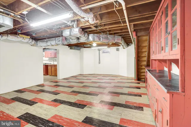 a backyard of a house with yard and outdoor seating