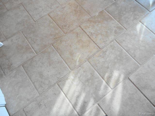 7882 Almont Road Almont, MI 48003 - Photo 20 of 21 tile floor.jpg