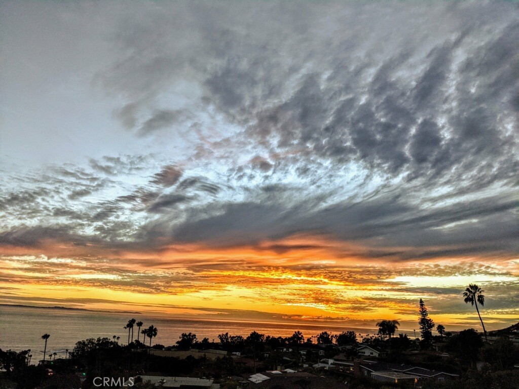 21702 Ocean Vista Drive, Unit B Laguna Beach, CA 92651 - Photo 5 of 47 Autumn has the most gorgeous sunsets viewed right from the lanai. Photo provided by the owner and authorized.