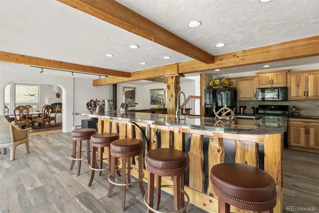 a spacious bathroom with a sink mirror and a bathtub