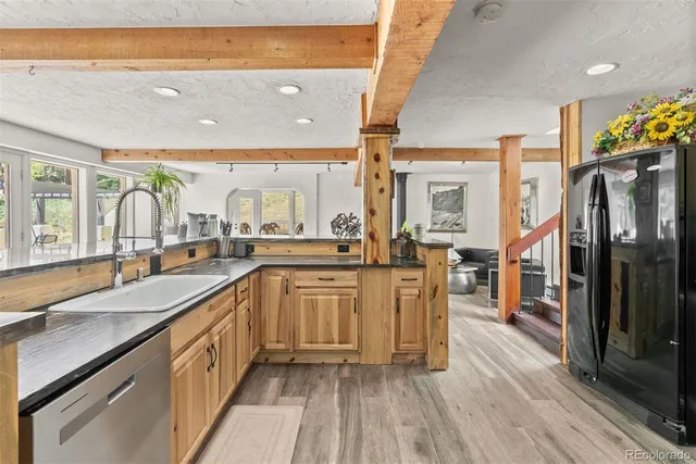 a living room with furniture or couch and a wooden floor