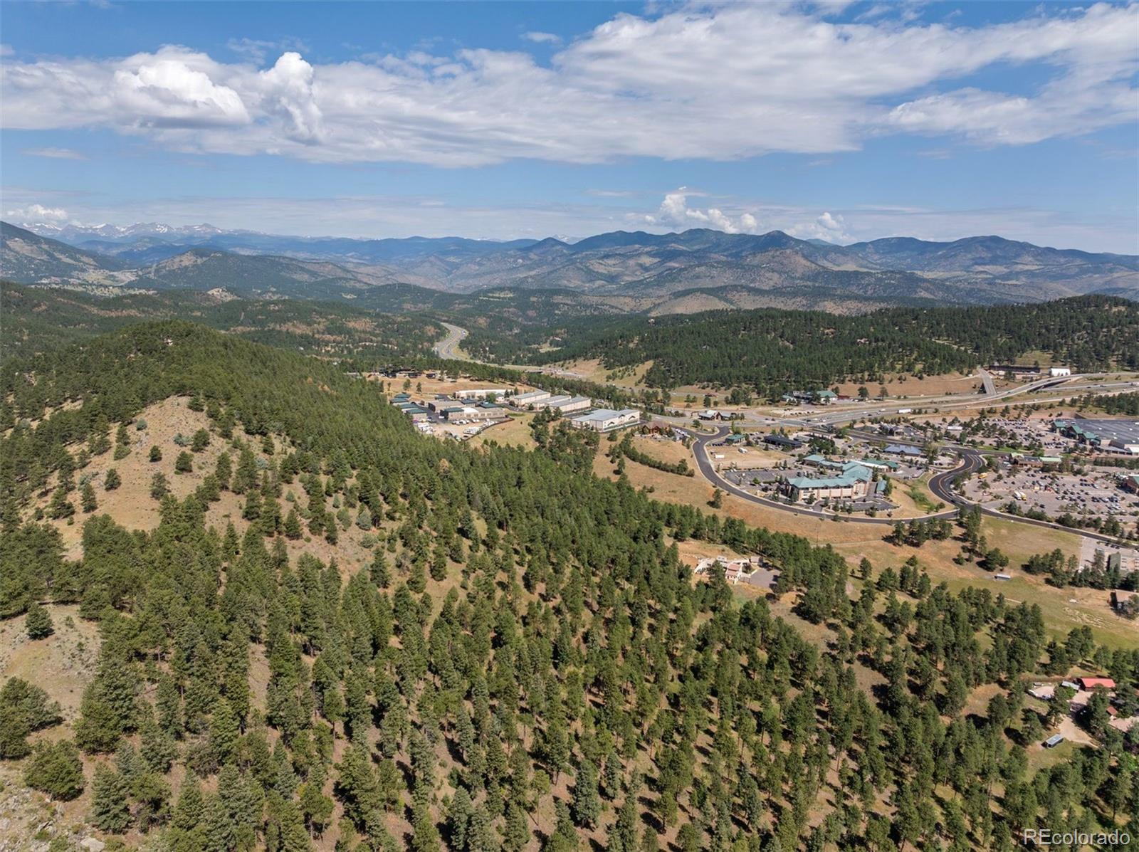 1053 Red Moon Road Evergreen, CO 80439 - Photo 4 of 50 a view of a city with mountains in the background