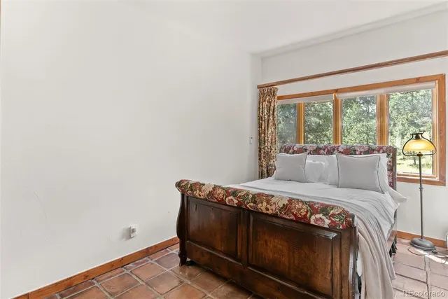 a view of bathroom with a sink mirror and shower