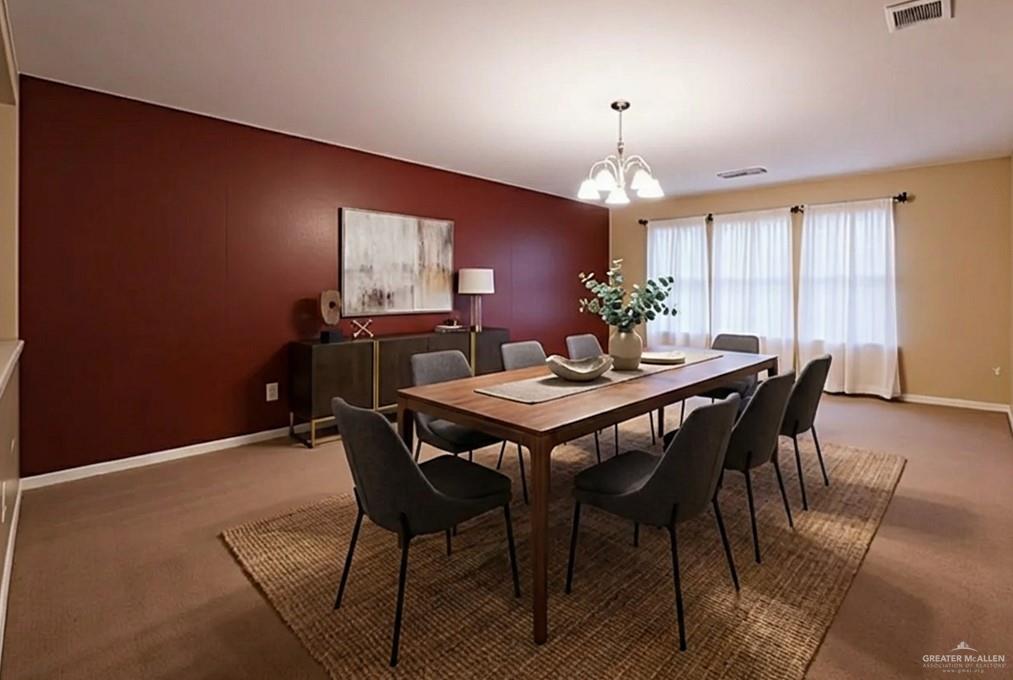 906 East Solar Drive Mission, TX 78574 - Photo 12 of 18 a view of a dining room with furniture and window