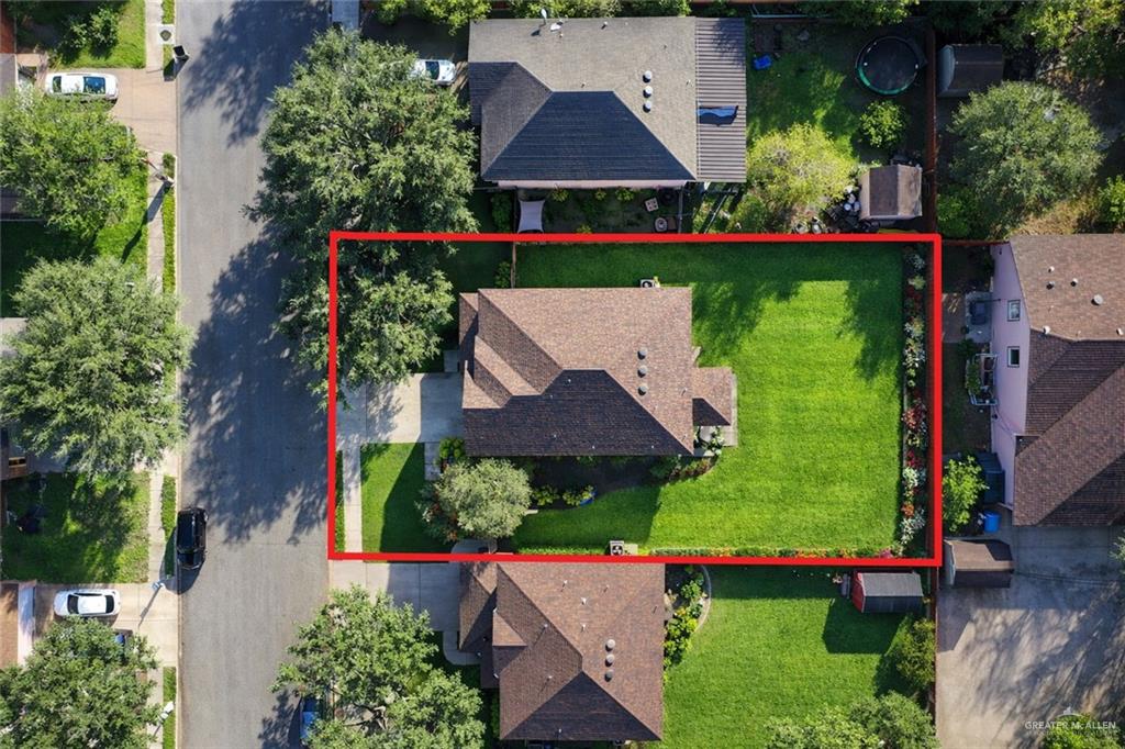 906 East Solar Drive Mission, TX 78574 - Photo 2 of 18 an aerial view of house with yard swimming pool and outdoor seating