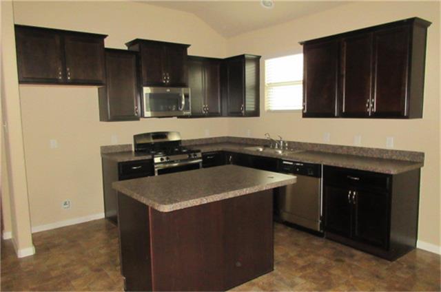 9451 Elliotts Court Conroe, TX 77304 - Photo 3 of 18 ISLAND KITCHEN