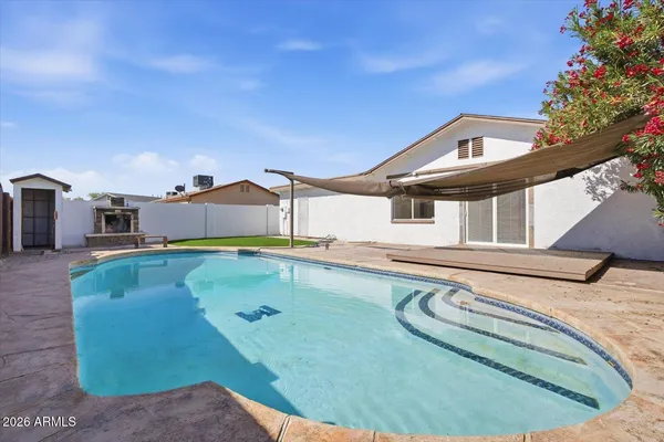 a view of a house with a swimming pool