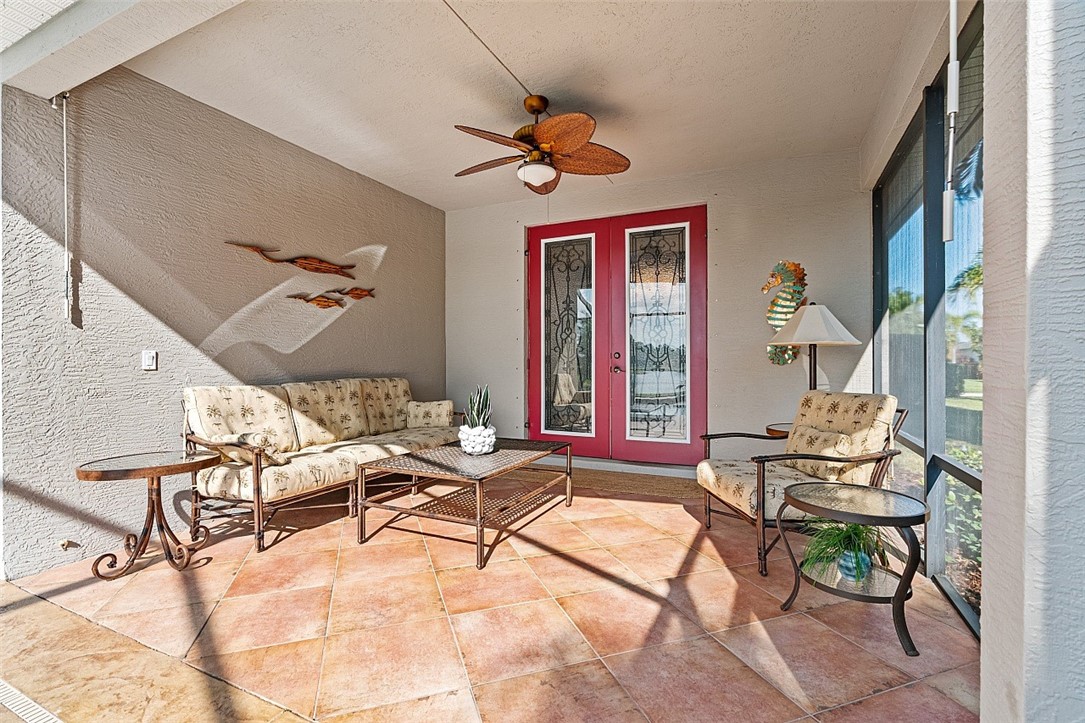 567 Gossamer Wing Way Sebastian, FL 32958 - Photo 18 of 35 a living room with patio furniture and a window