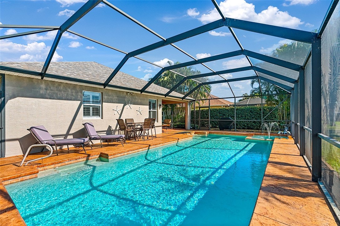 567 Gossamer Wing Way Sebastian, FL 32958 - Photo 20 of 35 a view of a backyard with swimming pool