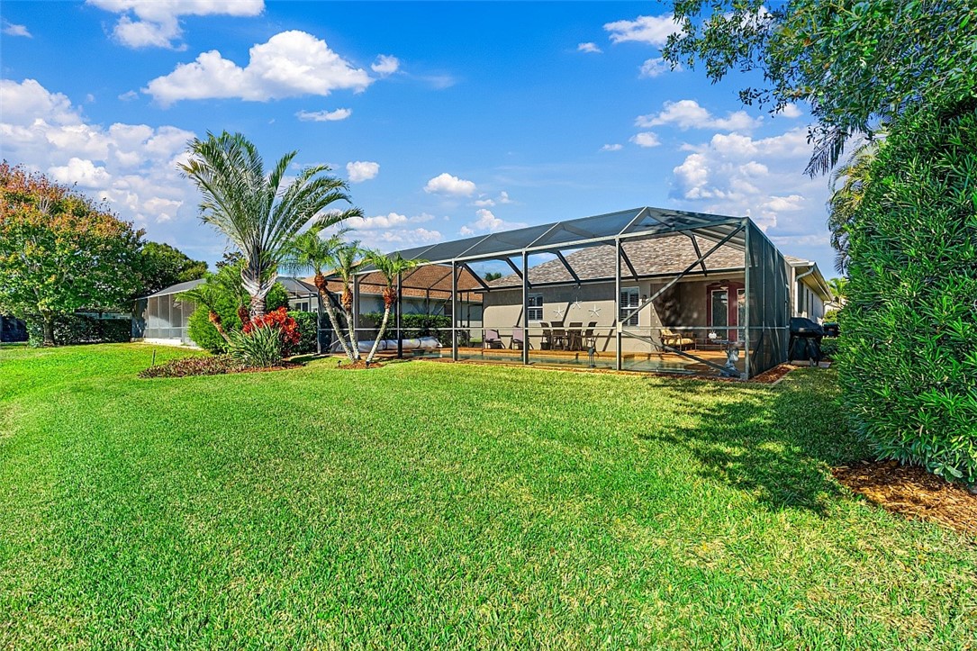 567 Gossamer Wing Way Sebastian, FL 32958 - Photo 21 of 35 a view of a yard with a fountain