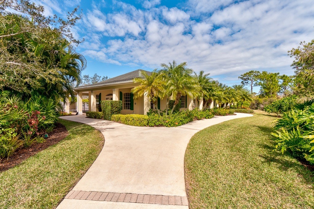 567 Gossamer Wing Way Sebastian, FL 32958 - Photo 22 of 35 a view of swimming pool with a garden