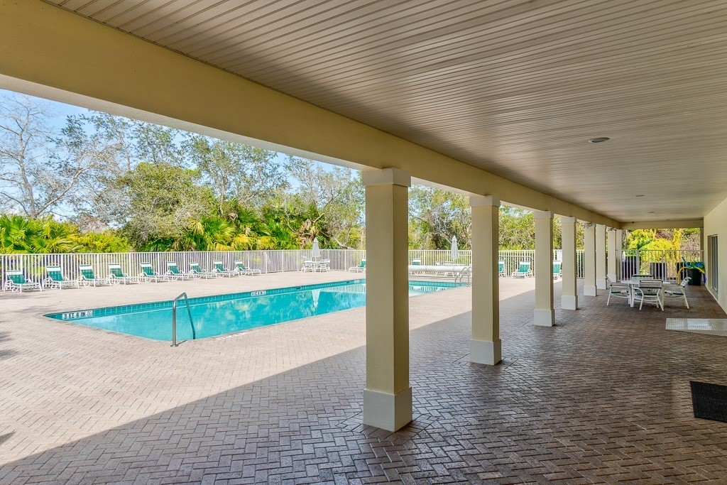 567 Gossamer Wing Way Sebastian, FL 32958 - Photo 24 of 35 a view of a porch and garden