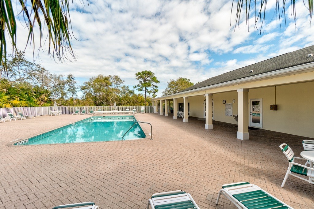 567 Gossamer Wing Way Sebastian, FL 32958 - Photo 25 of 35 a view of swimming pool with outdoor seating