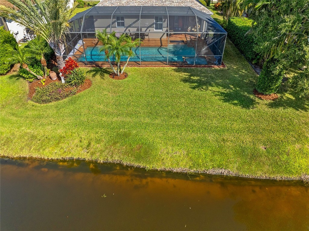 567 Gossamer Wing Way Sebastian, FL 32958 - Photo 29 of 35 an aerial view of residential houses with outdoor space and lake view