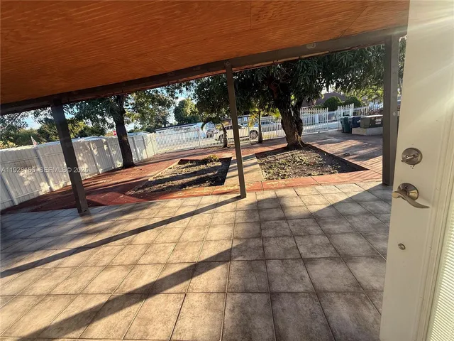 a view of a living room with furniture
