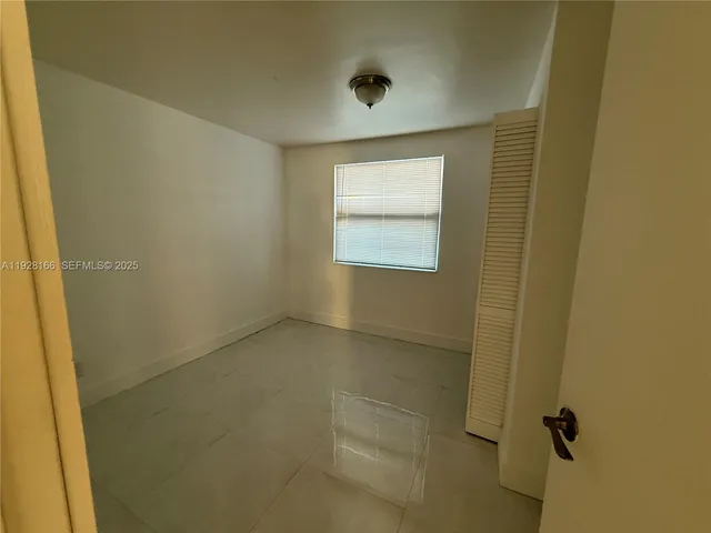 a bathroom with a window