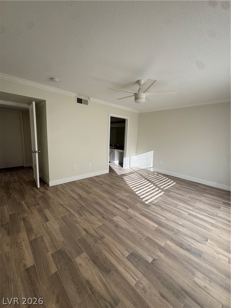 8101 West Flamingo Road, Unit 1040 Las Vegas, NV 89147 - Photo 11 of 22 This airy interior space features a high ceiling and durable flooring, creating an inviting atmosphere.