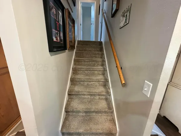 a bed room with a bed and a television