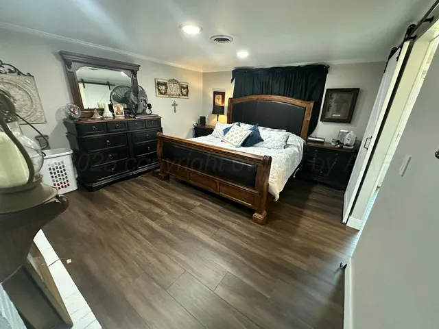 a bathroom with a sink mirror toilet and shower
