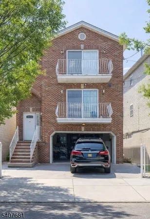 a car parked in front of a house