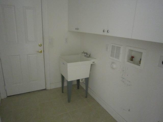 8716 Cobblestone Point Circle Boynton Beach, FL 33472 - Photo 27 of 32 Laundry off garage