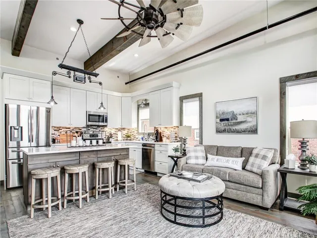 a living room with furniture and a table