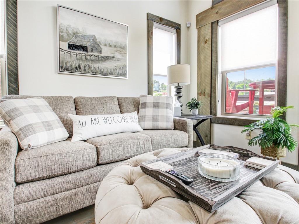 685 East Main Street, Unit B Blue Ridge, GA 30513 - Photo 18 of 57 a living room with furniture and a large window