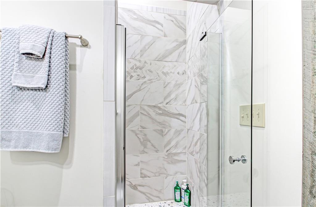 685 East Main Street, Unit B Blue Ridge, GA 30513 - Photo 26 of 57 view of a bathroom with a shower