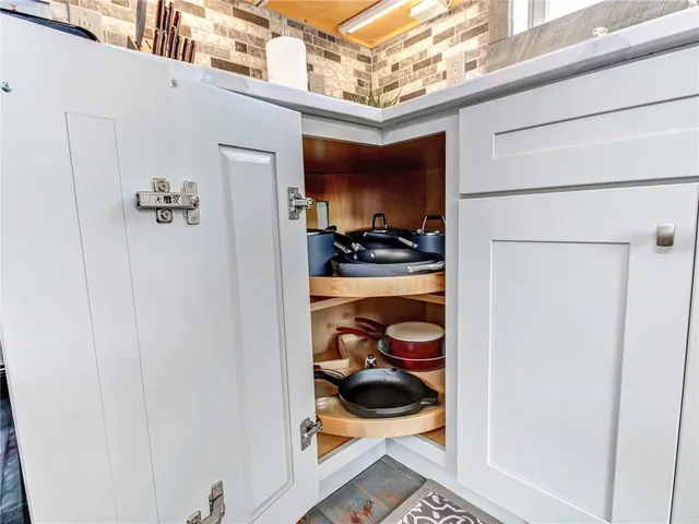 view of a living room with a large window