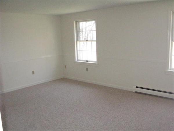 20 1/2 Webb Street, Unit 2A Middleton, MA 01949 - Photo 12 of 17 an empty room with a window