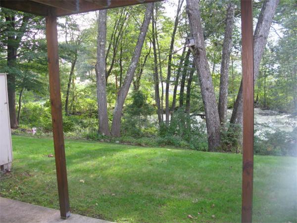 20 1/2 Webb Street, Unit 2A Middleton, MA 01949 - Photo 14 of 17 a view of a lush green forest