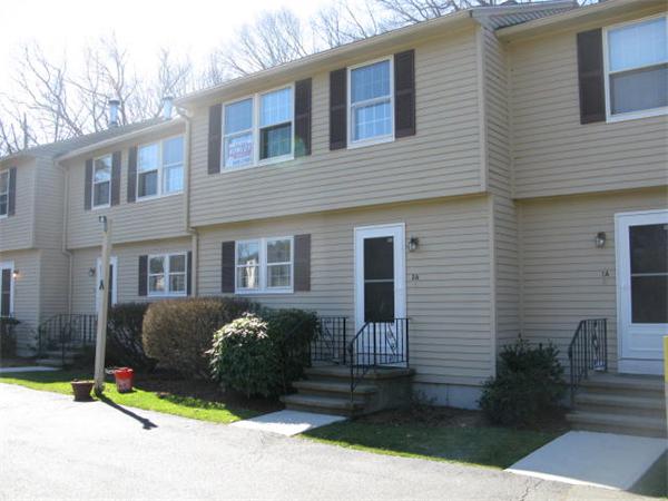 20 1/2 Webb Street, Unit 2A Middleton, MA 01949 - Photo 17 of 17 a front view of a house with garden