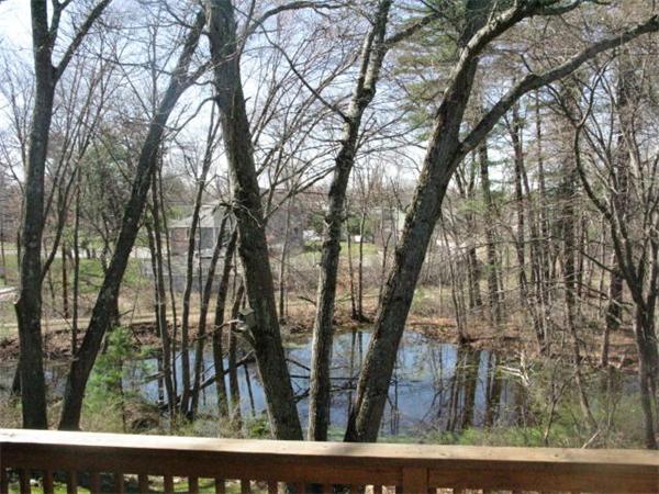 20 1/2 Webb Street, Unit 2A Middleton, MA 01949 - Photo 7 of 17 a view of backyard with green space