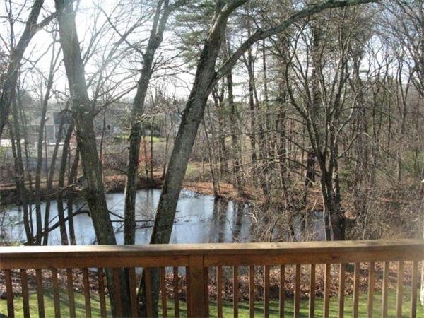 20 1/2 Webb Street, Unit 2A Middleton, MA 01949 - Photo 9 of 17 a view of a trees in a roof deck