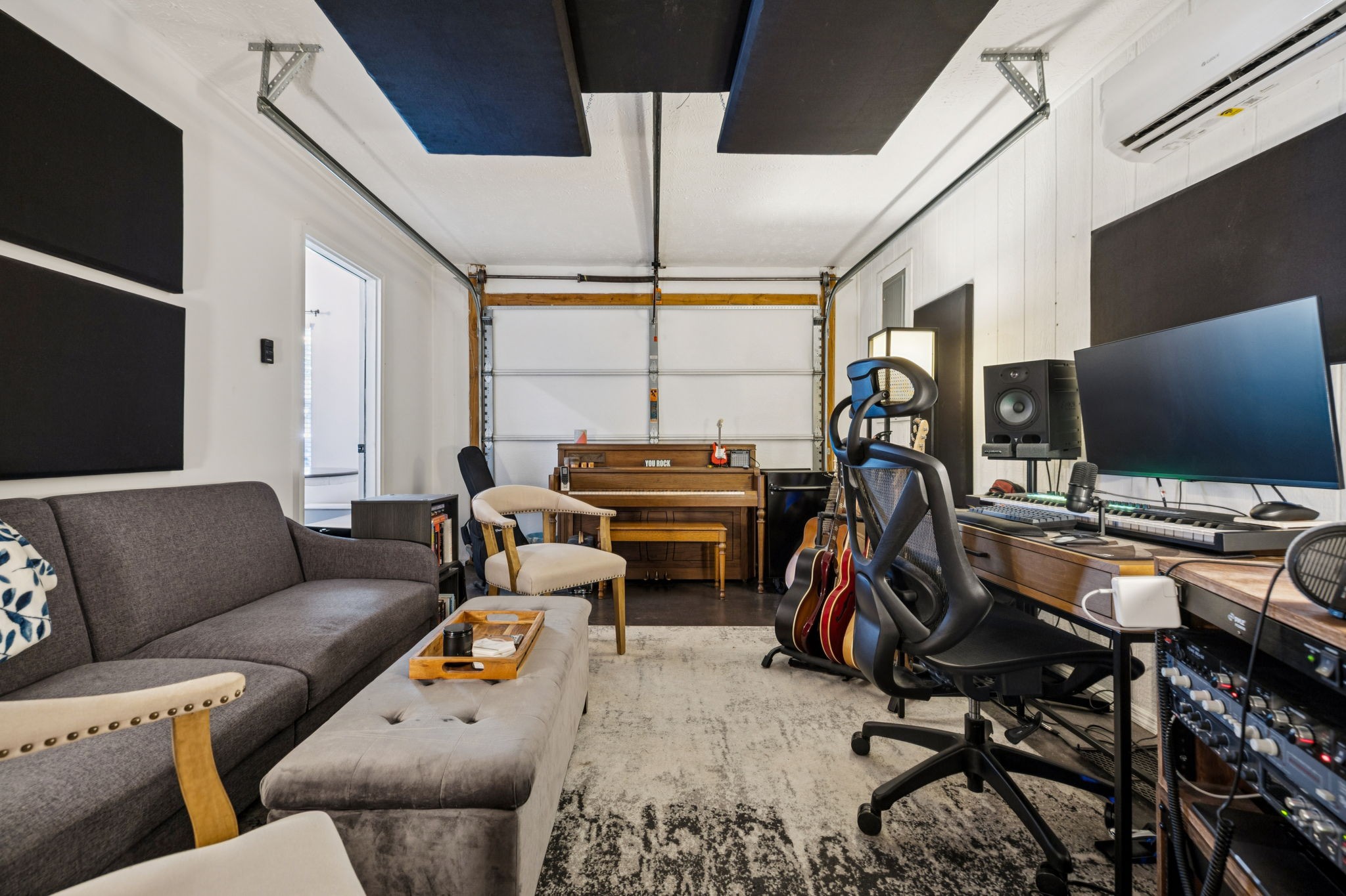 5049 Tabitha Street Murfreesboro, TN 37129 - Photo 20 of 28 a living room with furniture and a flat screen tv