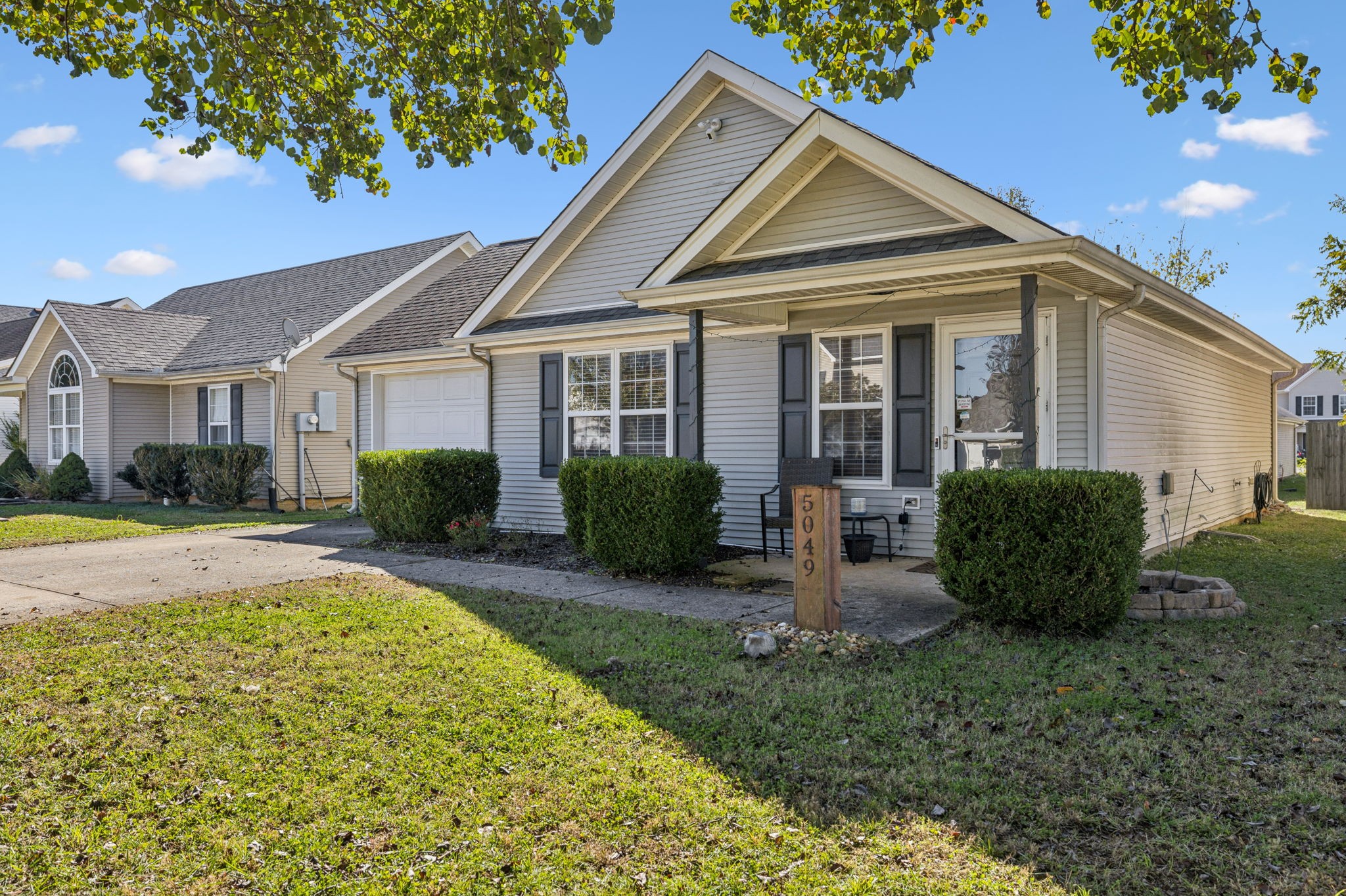 5049 Tabitha Street Murfreesboro, TN 37129 - Photo 2 of 28 a view of a house with backyard and sitting area