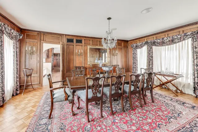 a kitchen with granite countertop a sink stove and cabinets