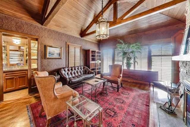 a living room with a couch and a fireplace