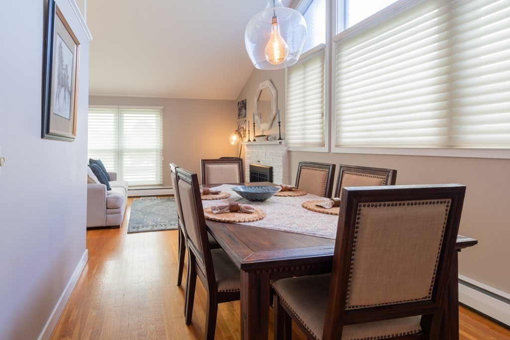 64 Hills Ferry Road Nashua, NH 03064 - Photo 11 of 34 a view of a dining room with furniture and window