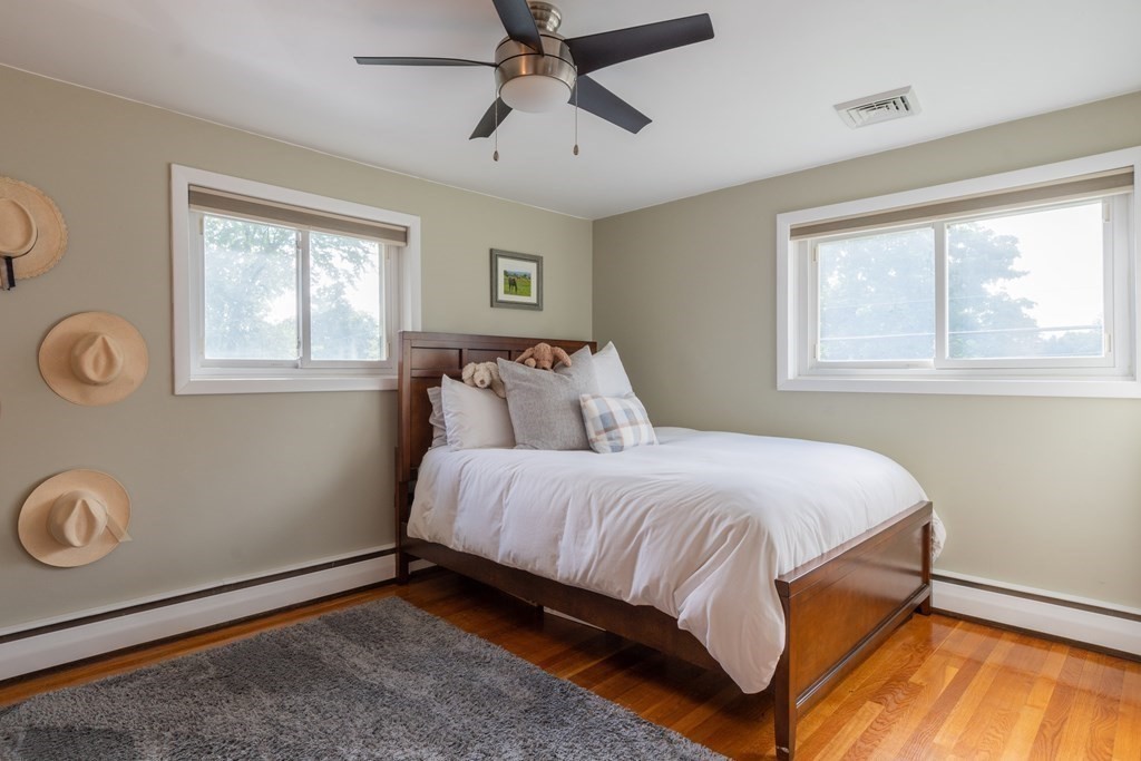 64 Hills Ferry Road Nashua, NH 03064 - Photo 21 of 34 a bedroom with a bed and window