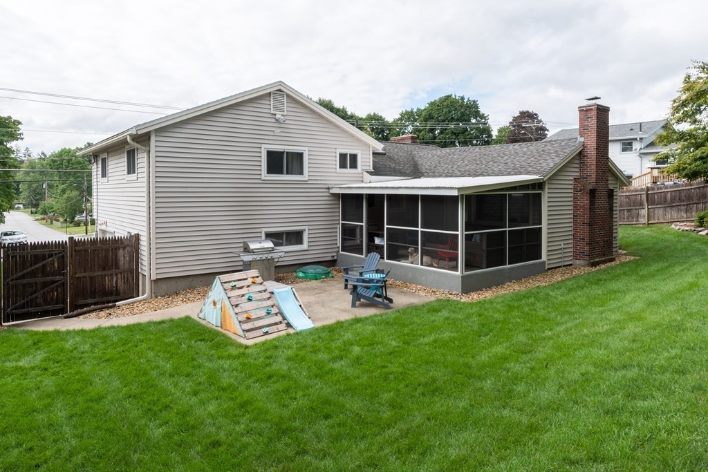 64 Hills Ferry Road Nashua, NH 03064 - Photo 34 of 34 a view of a house with a yard and deck