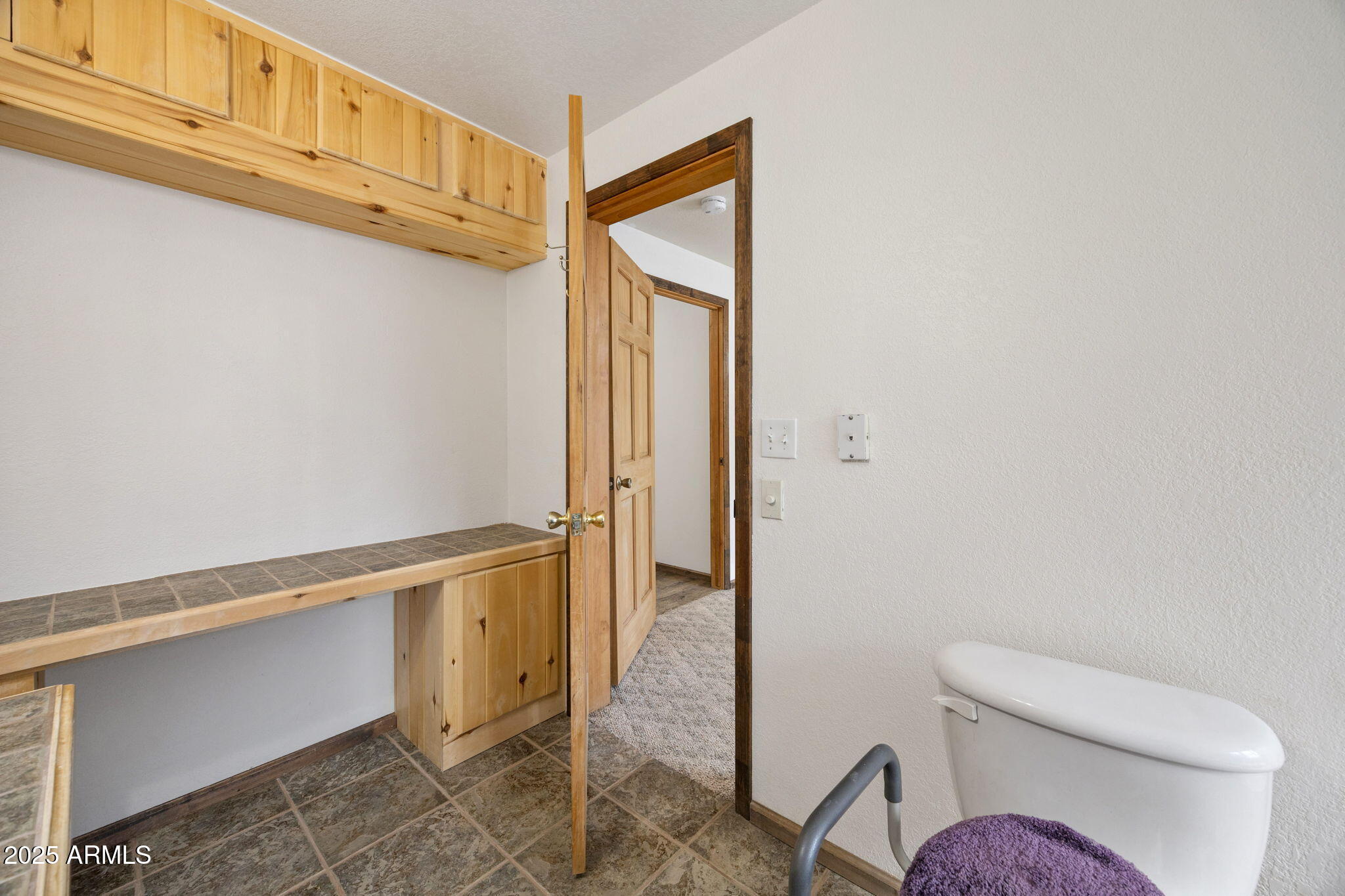 2882 Verde Road Overgaard, AZ 85933 - Photo 18 of 33 a bathroom with a toilet and a shower