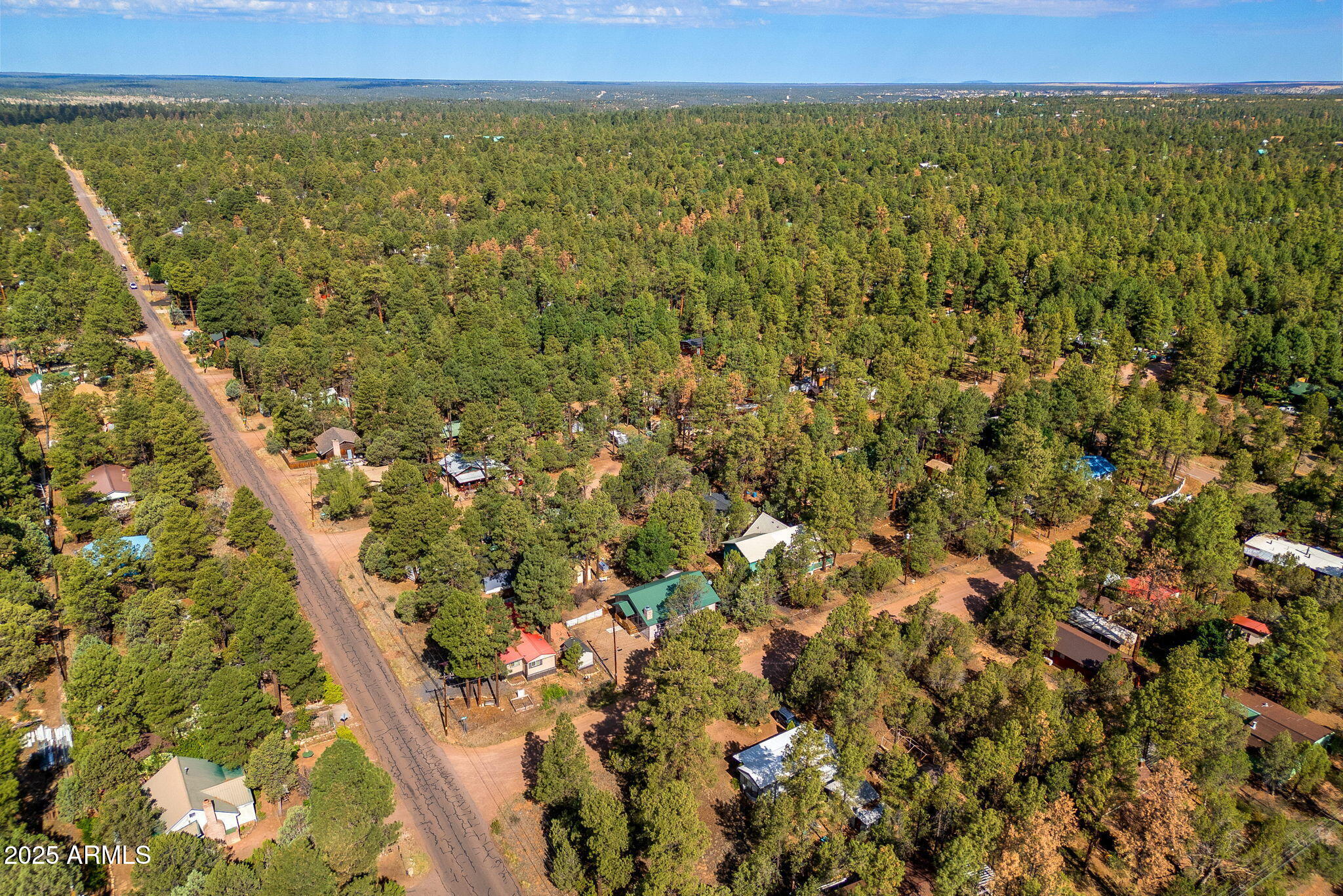 2882 Verde Road Overgaard, AZ 85933 - Photo 28 of 33 a view of a city with an outdoor space