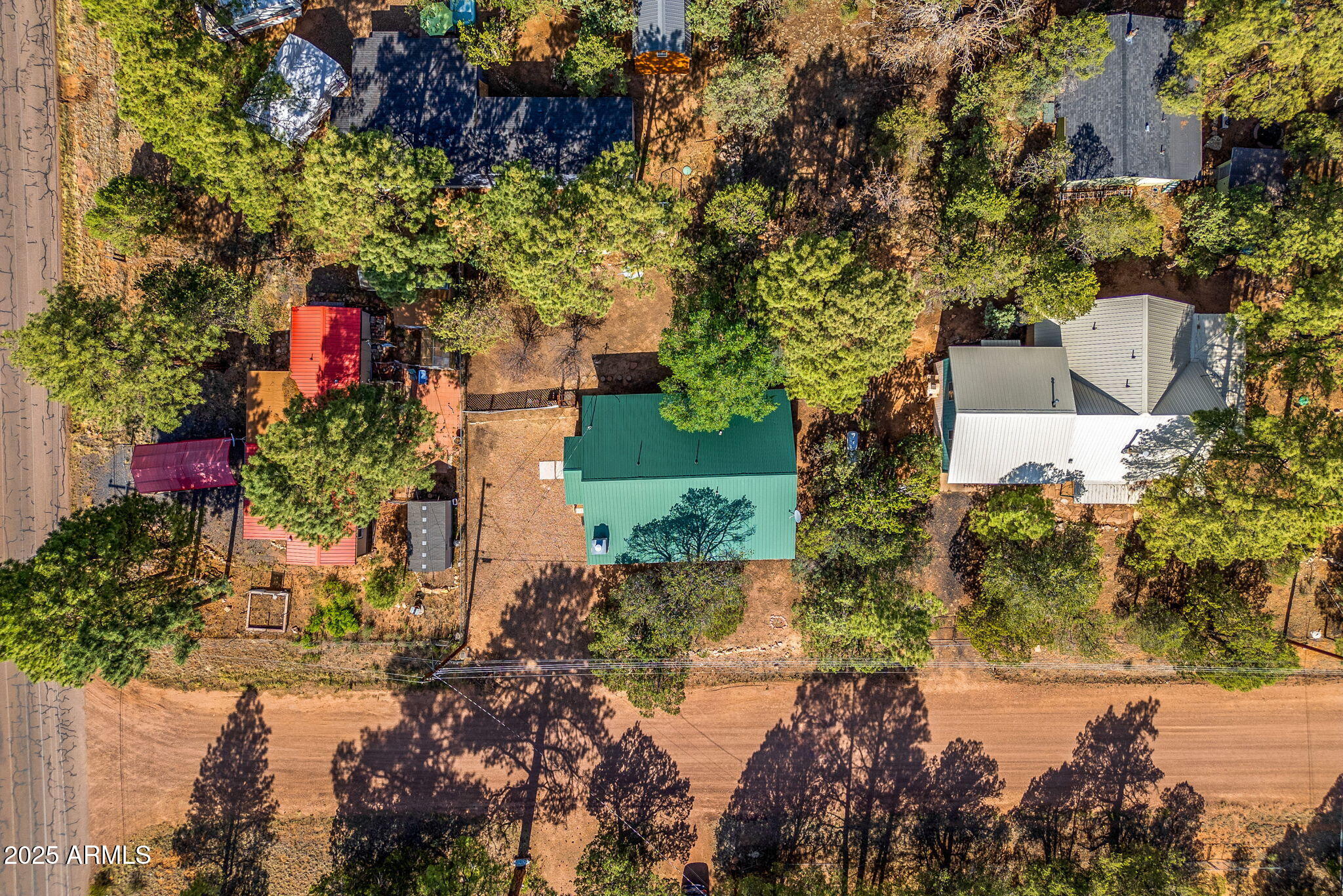 2882 Verde Road Overgaard, AZ 85933 - Photo 30 of 33 an aerial view of residential house with outdoor space and trees around