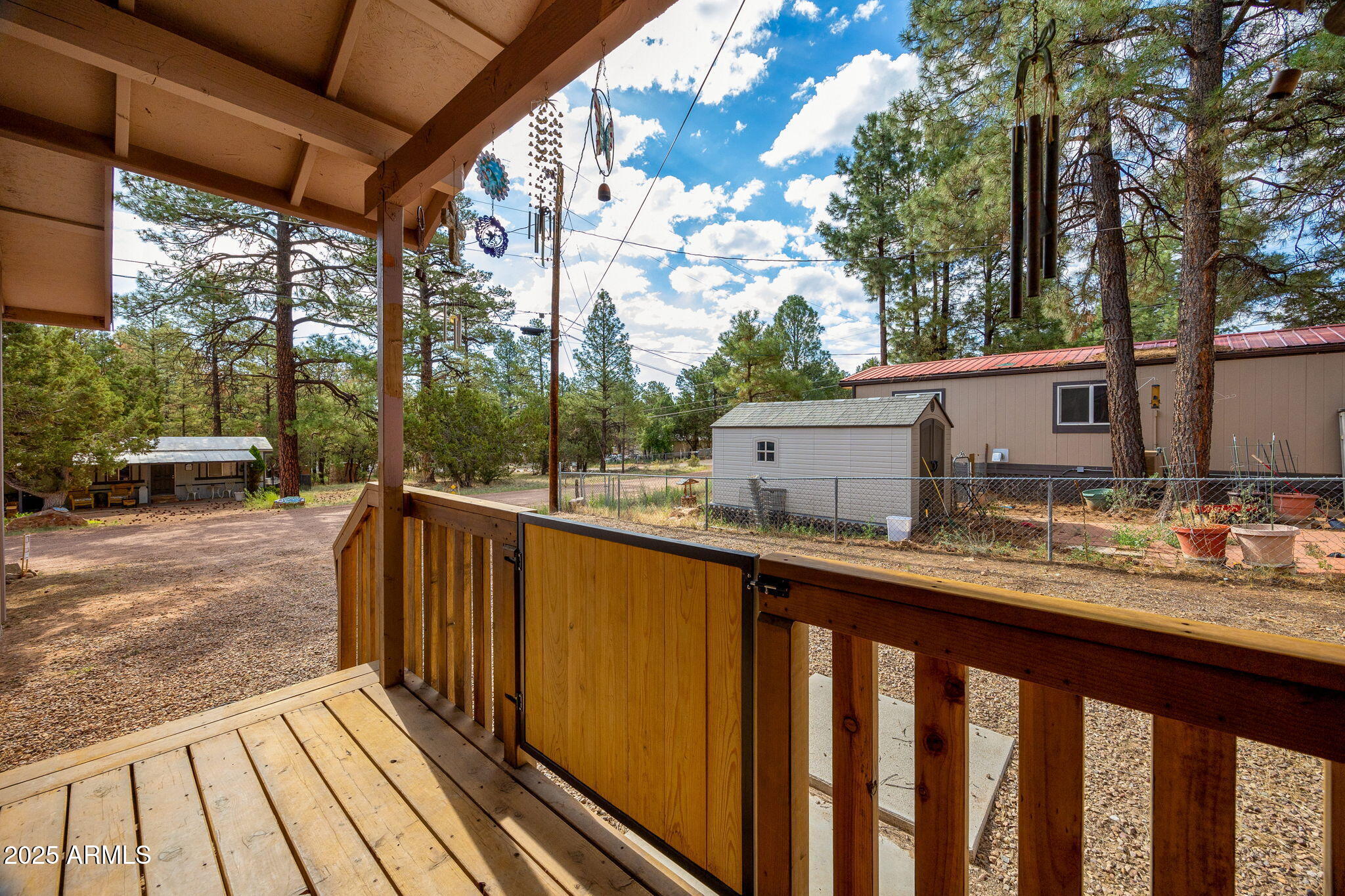 2882 Verde Road Overgaard, AZ 85933 - Photo 5 of 33 a view of a street with wooden bench